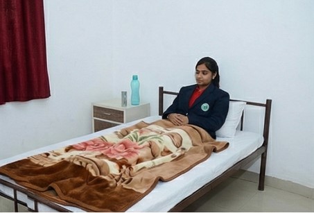 Quiet recovery area with comfortable bedding for students