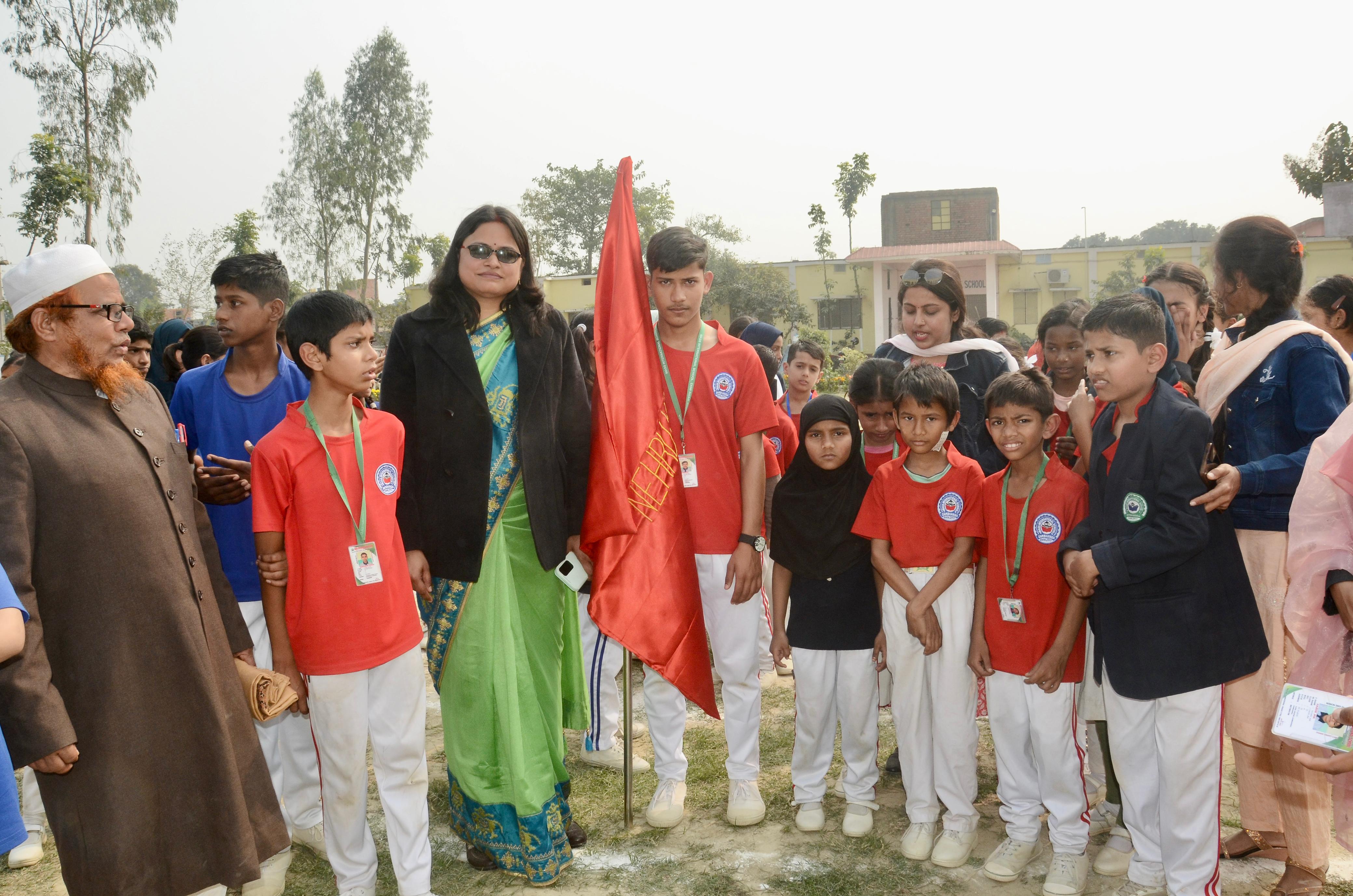 Students playing on the tennis and badminton courts