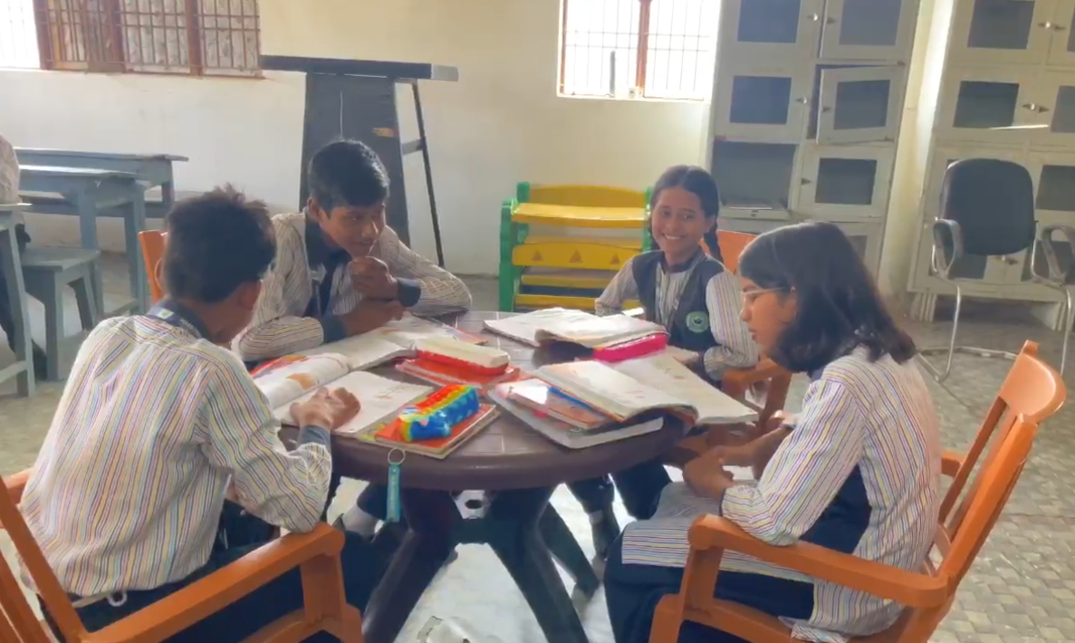 Bright classroom with large windows and natural light